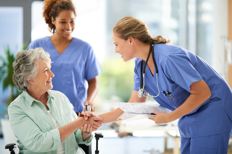 nurse delegator with patient